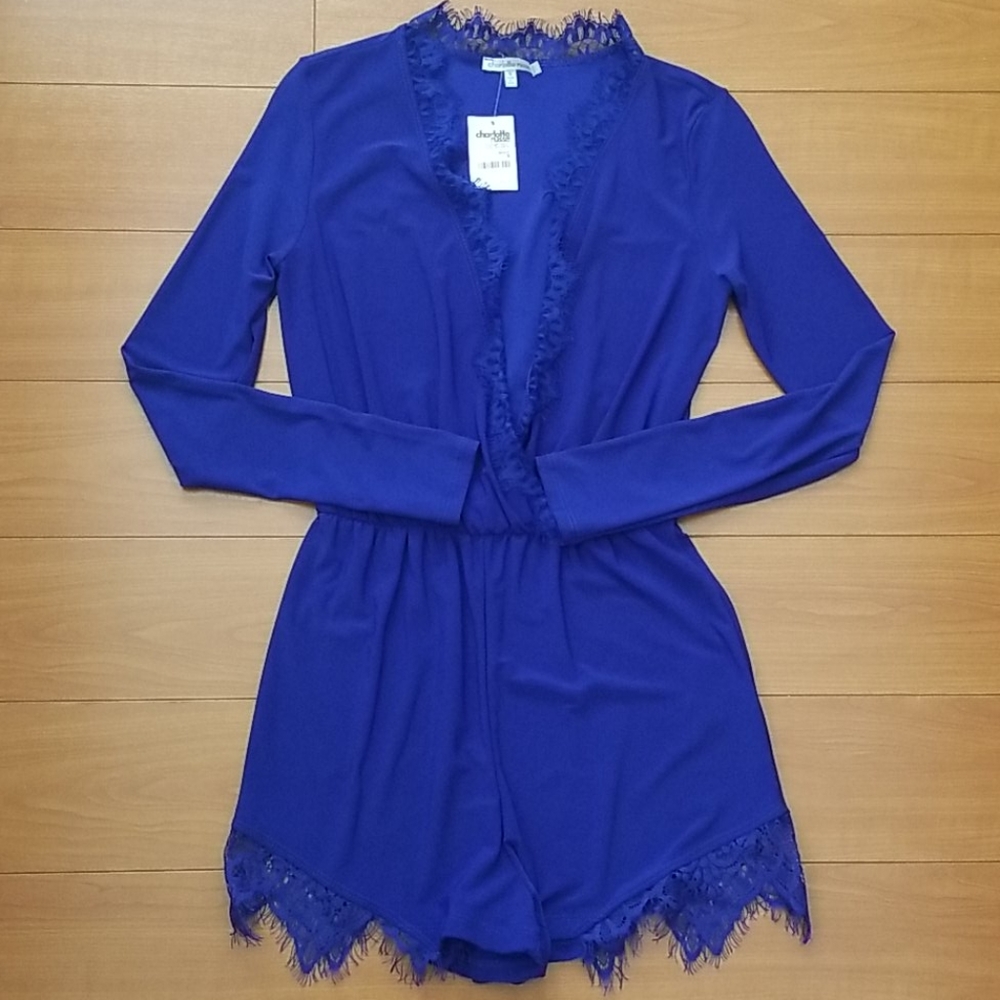 💙 Dark blue romper. New, never worn.
